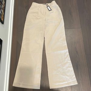 Stone (light tan) trousers. Never worn.